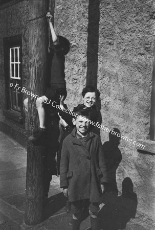 CHILDREN PLAYING IN STREET